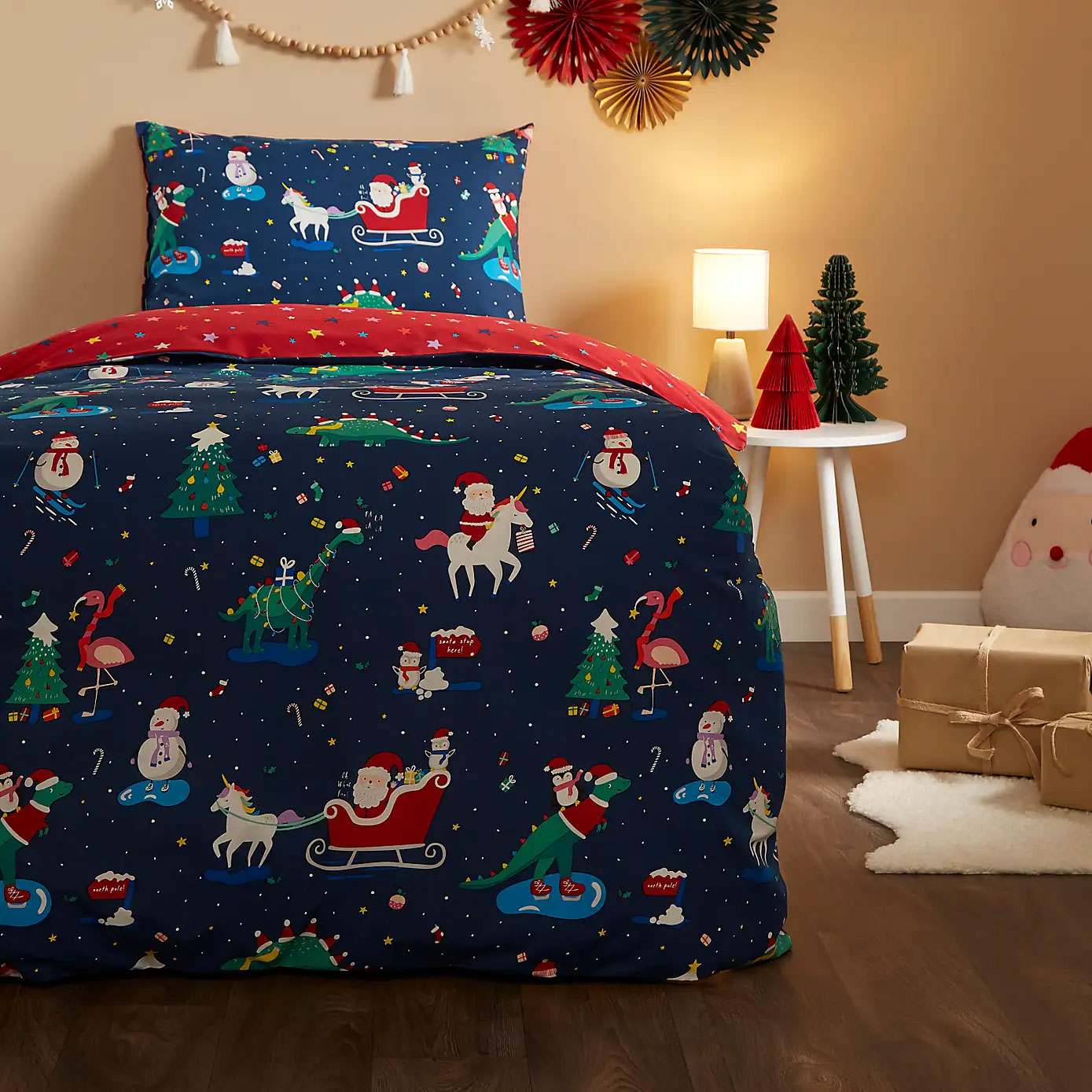 festive dinosaur and unicorn duvet cover and pillowcase