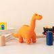 Orange Diplodocus Knitted Dinosuar Baby Rattle - Best Years Thumbnail Image 3